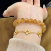 05-手链展示图 Golden Tiger Crystal Bracelet with Yellow Tower Crystal and Black Gold Super Seven